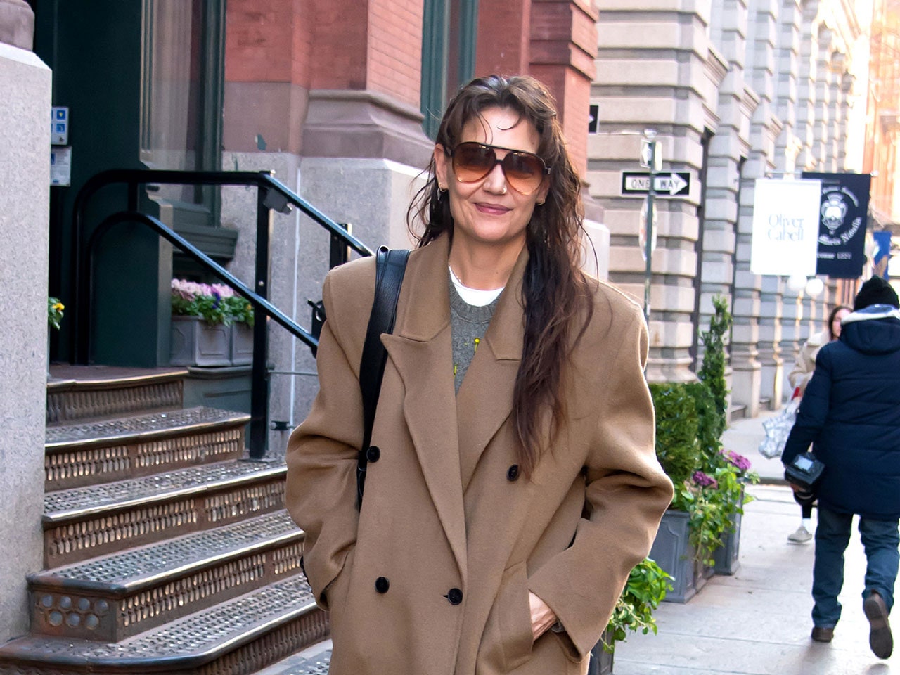 Katie holmes blings out her winter coat