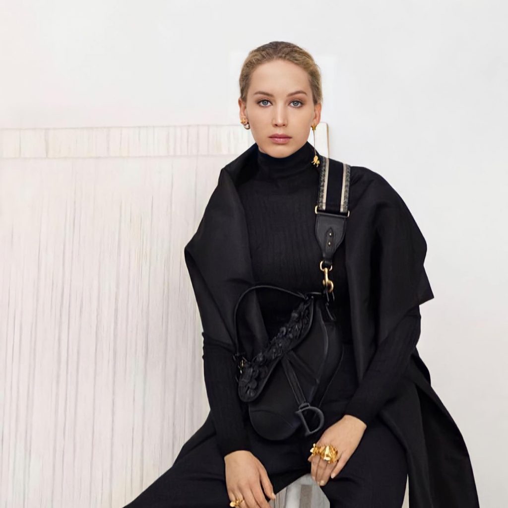 Jennifer lawrence winter coat statement bag